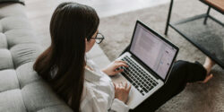 Freelance writer using her laptop to work on an assignment.