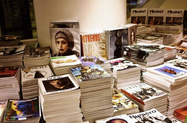 stacks of all types of magazines and publications in a room