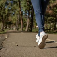 Close view of someone walking to earn money via StepBet.