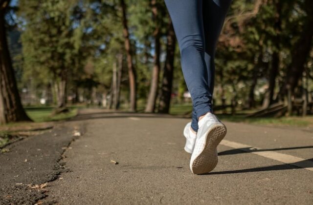 Close view of someone walking to earn money via StepBet.