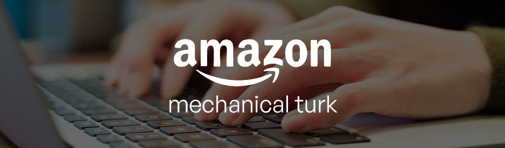 Amazon Mechanical Turk logo against a darkened background showing a freelancer's hands typing on a laptop