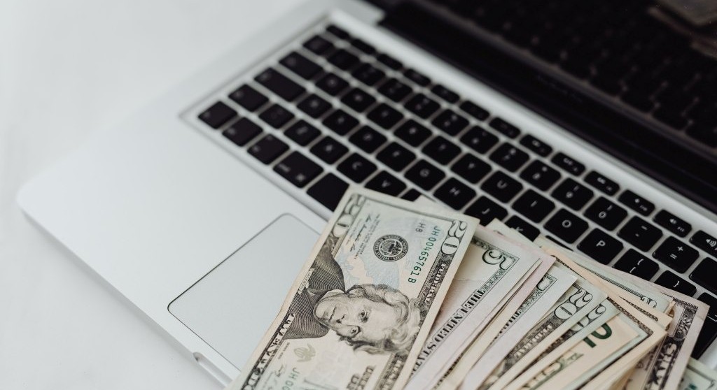 Freelancer's monthly stipend for Upwork Connects spread on table.