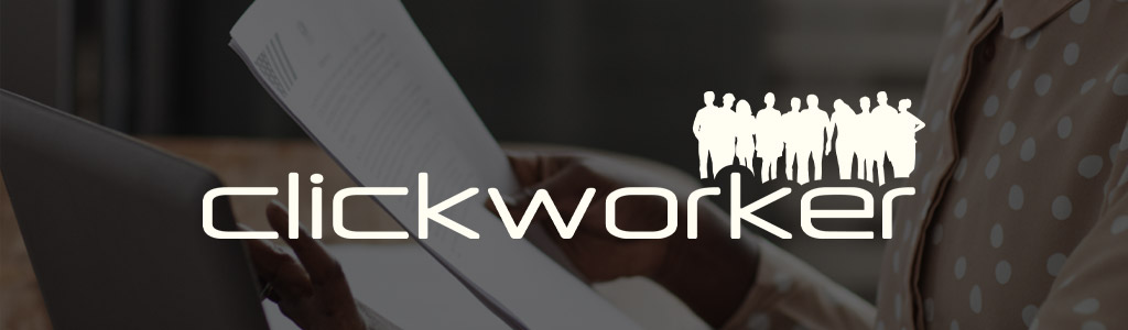 Clickworker logo against a darkened background showing a freelancer with documents and a laptop