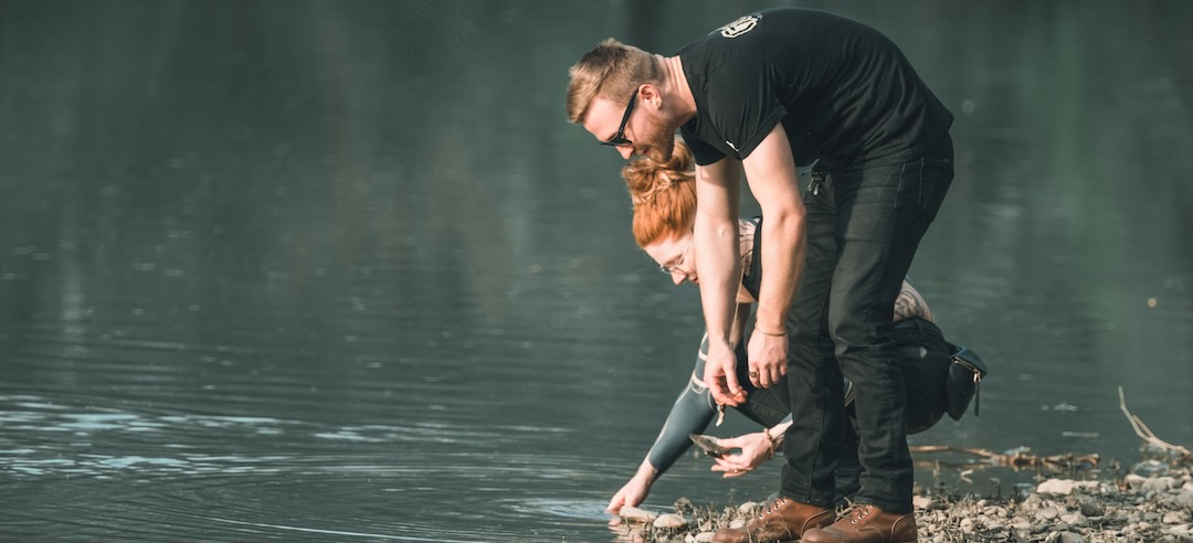 Couple searching for gold in a river.