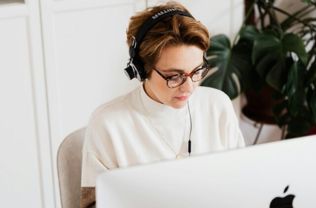 Transcriber for DailyTranscription.com working at her laptop.