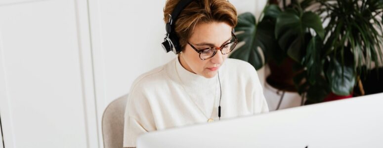 Transcriber for DailyTranscription.com working at her laptop.