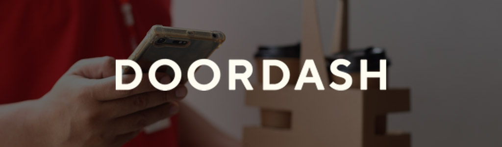 DoorDash logo against the background of a gig worker accepting an order on his phone