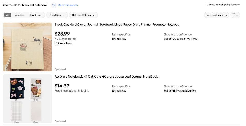 eBay product search page showing the results for black cat-themed notebooks.