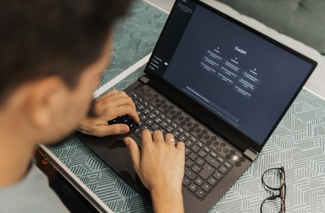 An employee prompting ChatGPT to complete a work task.
