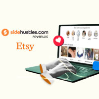 Hands of an Etsy seller typing on a laptop open to product listings in their Etsy store