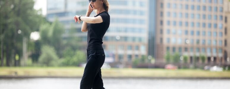 Woman walking to earn extra money with the Evidation app.