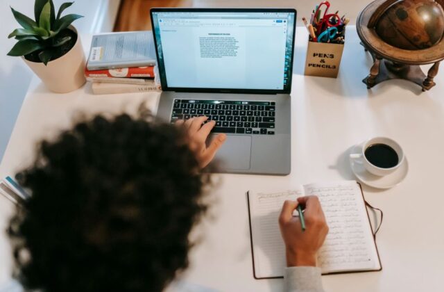 Freelance writer finishing up work project they booked on Upwork.