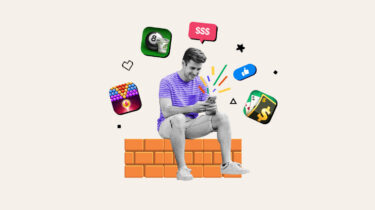 Man sitting on wall playing a game on his phone surrounded by logos of games that pay real money