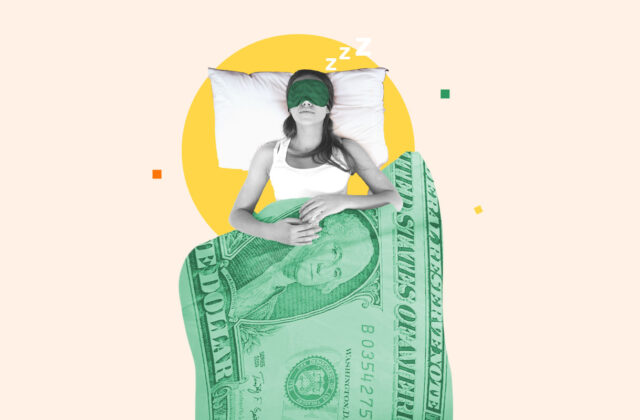 Woman lying in bed under a dollar-patterned blanket representing getting paid to sleep as a side hustle