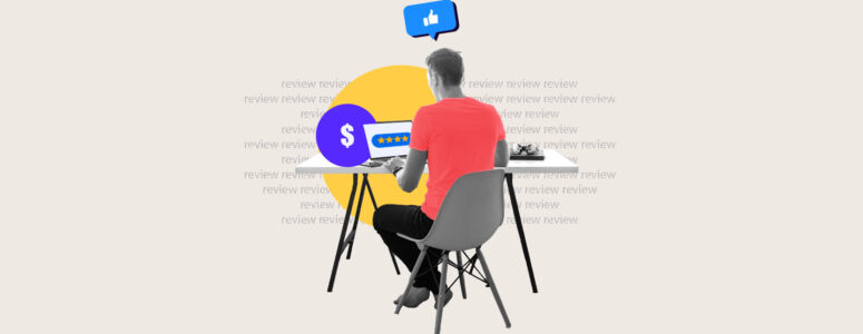 Freelance writer sitting at computer getting paid to write reviews