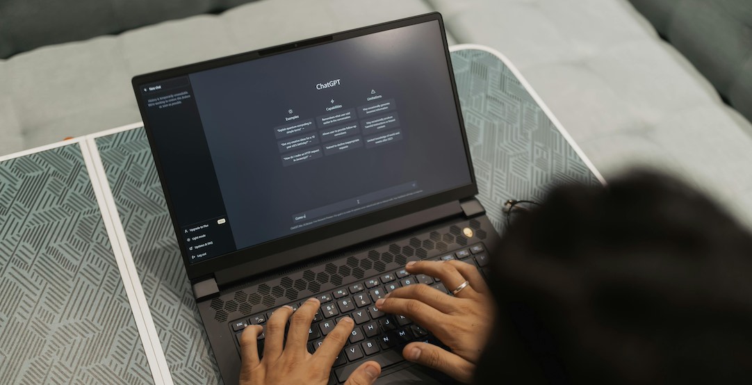 Man on his computer asking ChatGPT for advice.