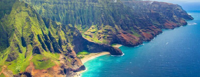 Landscape of Honolulu, Hawaii, showing beaches and the coast against a blue sky