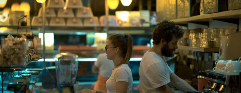 Two part-time workers in a restaurant.