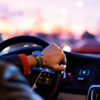 Rideshare driver behind the wheel of his car.