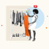 Stylish personal stylist pulling an orange dress out of a closet