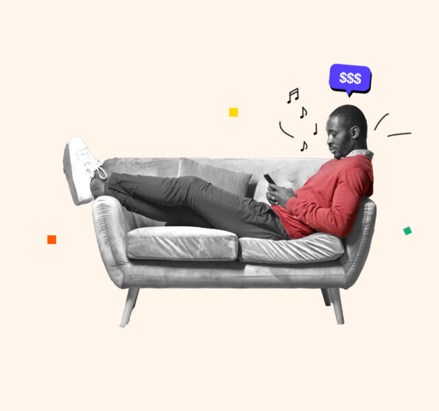 Man sitting on his couch earning money by doing nothing