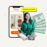 Etsy selling sitting in front of a background showing a listing for a printable and a stack of cash.
