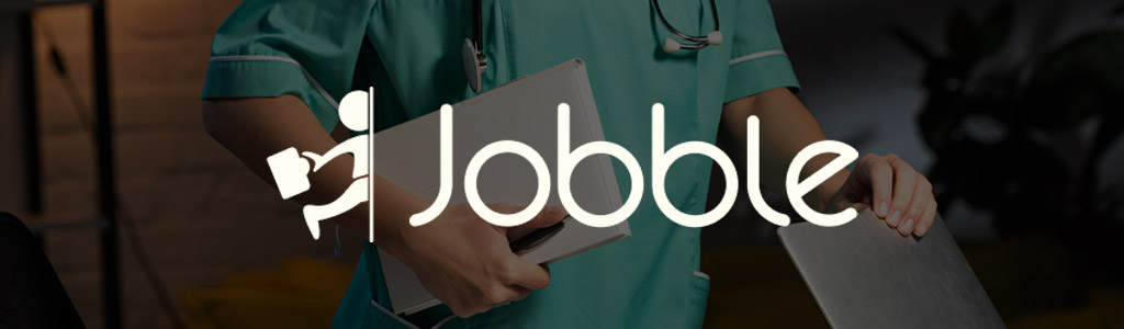Jobble logo against a darkened background showing someone doing shift work