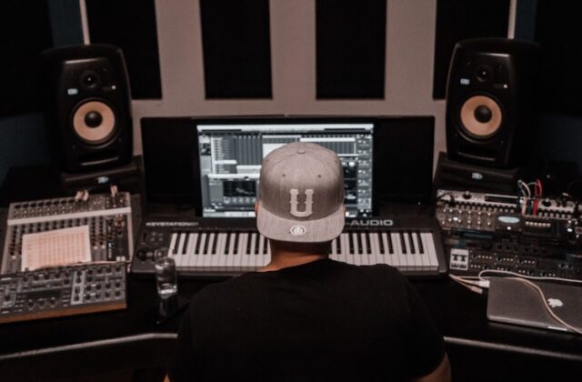 Music producer working at their desk.