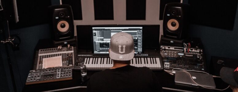 Music producer working at their desk.