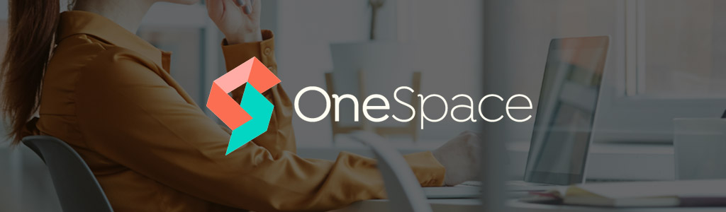 OneSpace logo against a darkened background showing a freelancer using a laptop at a desk