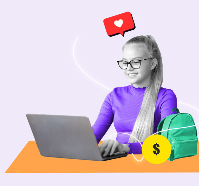 Teenager sitting at laptop working an online job