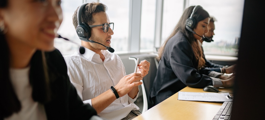 Customer support representatives working.