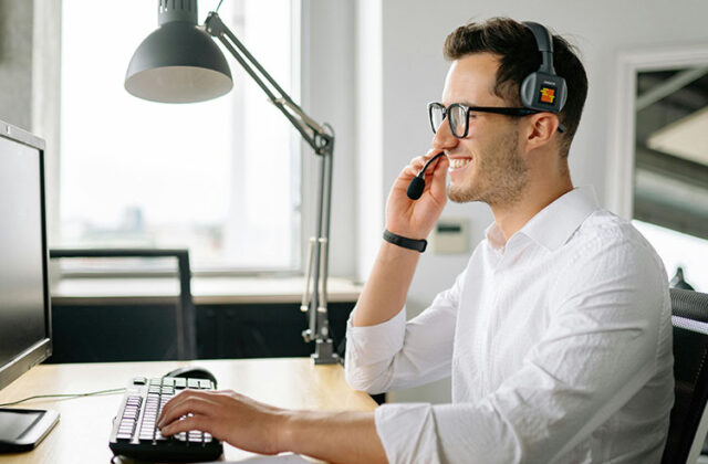 Customer service rep working remotely from home.