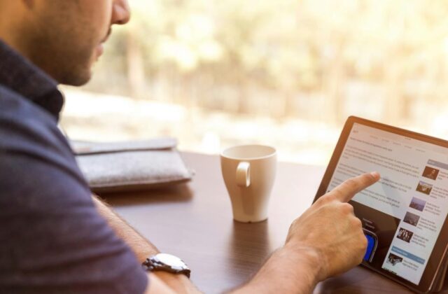 Freelance worker browsing a job post on a freelance job board.