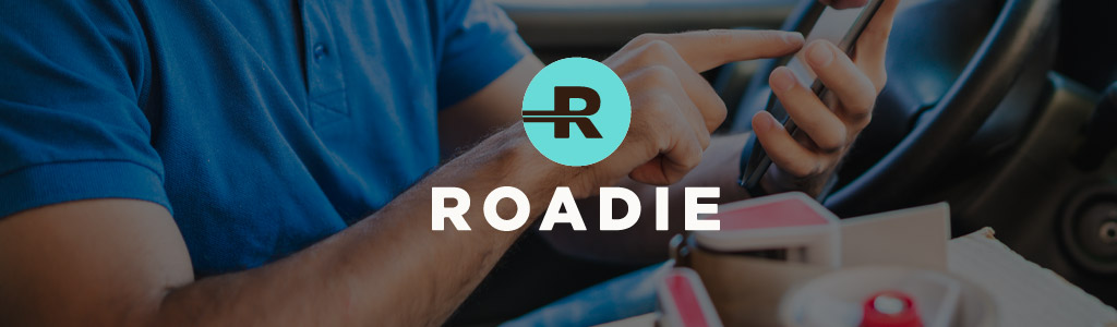 Roadie logo against a background of a Roadie driver using the app