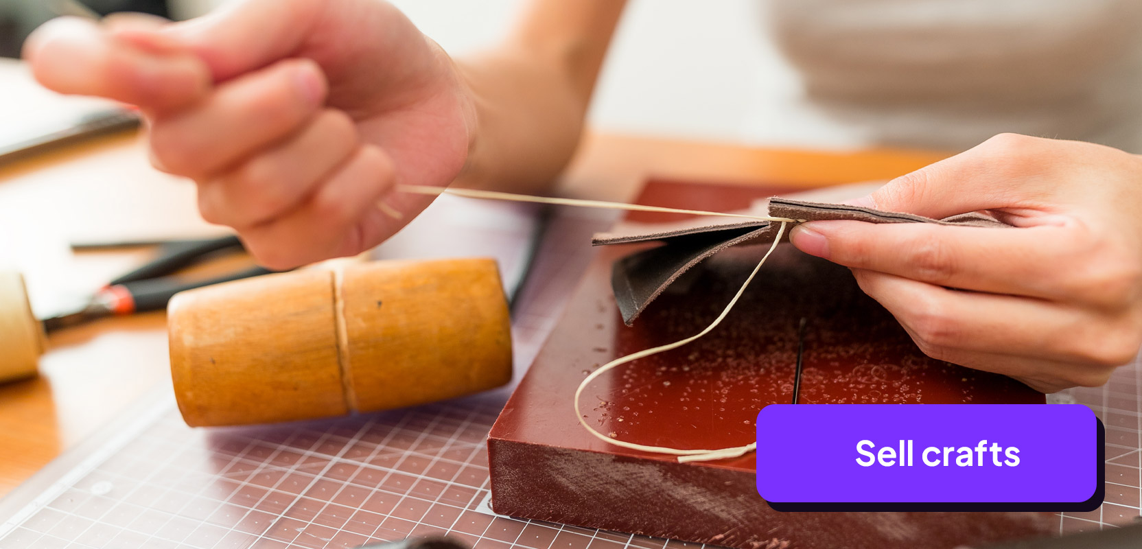Teen crafting a leather item to sell online for money