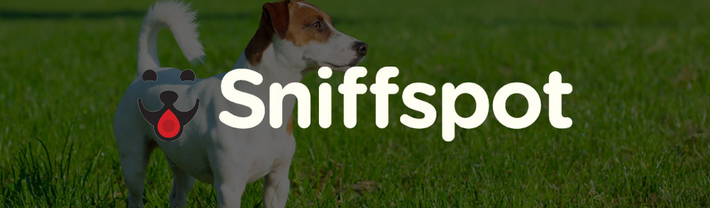 Sniffspot logo against a darkened background showing a dog on a grassy field