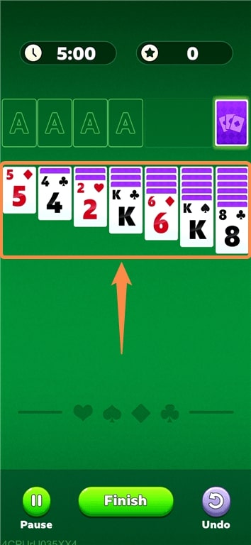 Some piles of cards players need to turn over and move to win Solitaire Clash.