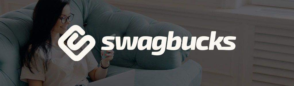 Swagbucks logo against a background of someone using their mobile phone