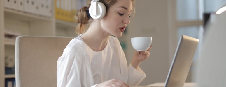 Transcriptionist listening to audio she's transcribing.