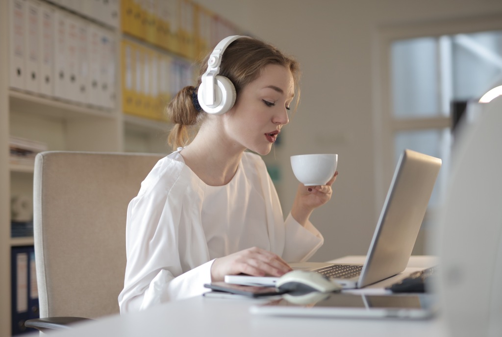 Transcriptionist listening to audio she's transcribing.