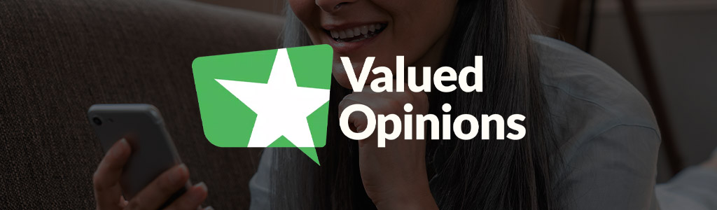 Valued Opinions logo against a background of someone using their mobile phone