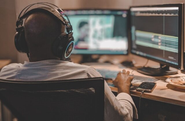 Video editor working on a promotional video for a skincare brand.