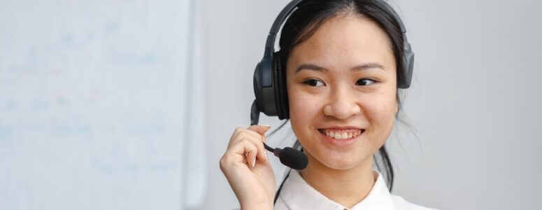 Virtual assistant taking a call on a headset.