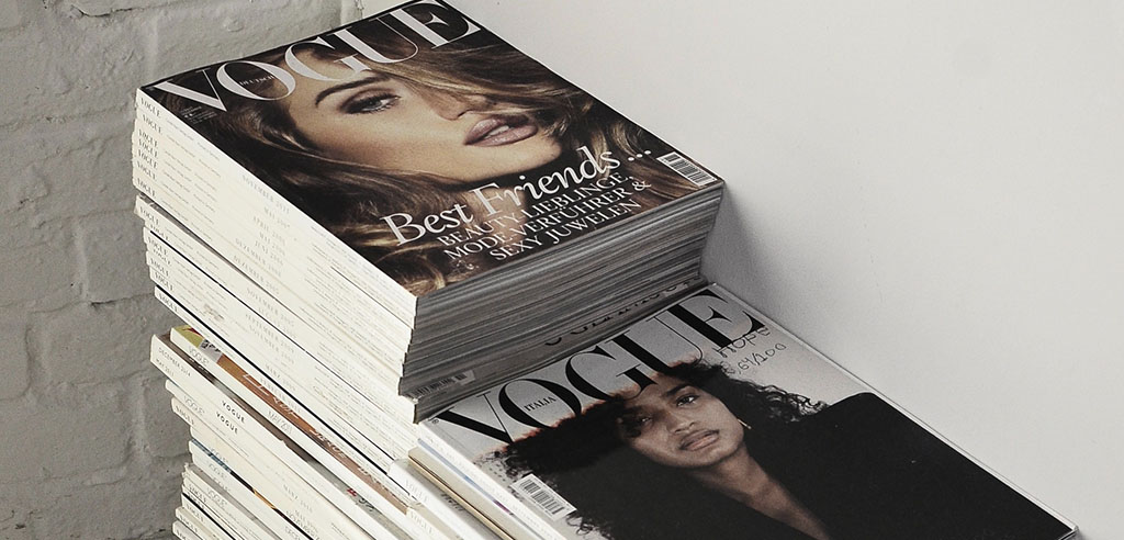 a stack of vogue fashion magazine