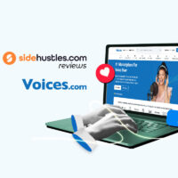 Hands of a voice actor typing on a laptop that's open to the Voices.com homepage