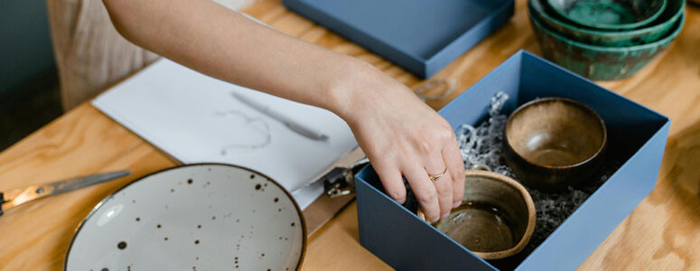 Handmade seller organizing her inventory.