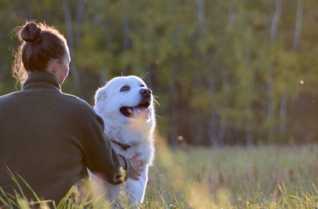 Image of a woman with her dog.