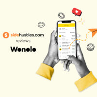 Two hands holding a smartphone displaying available jobs in the Wonolo app